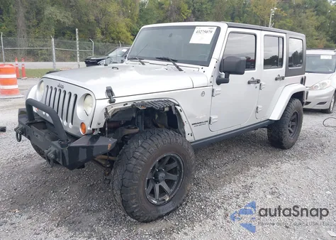 2007 Jeep Wrangler Unlimited Sahara from USA, damaged, VIN 1J4GA59187L182621
